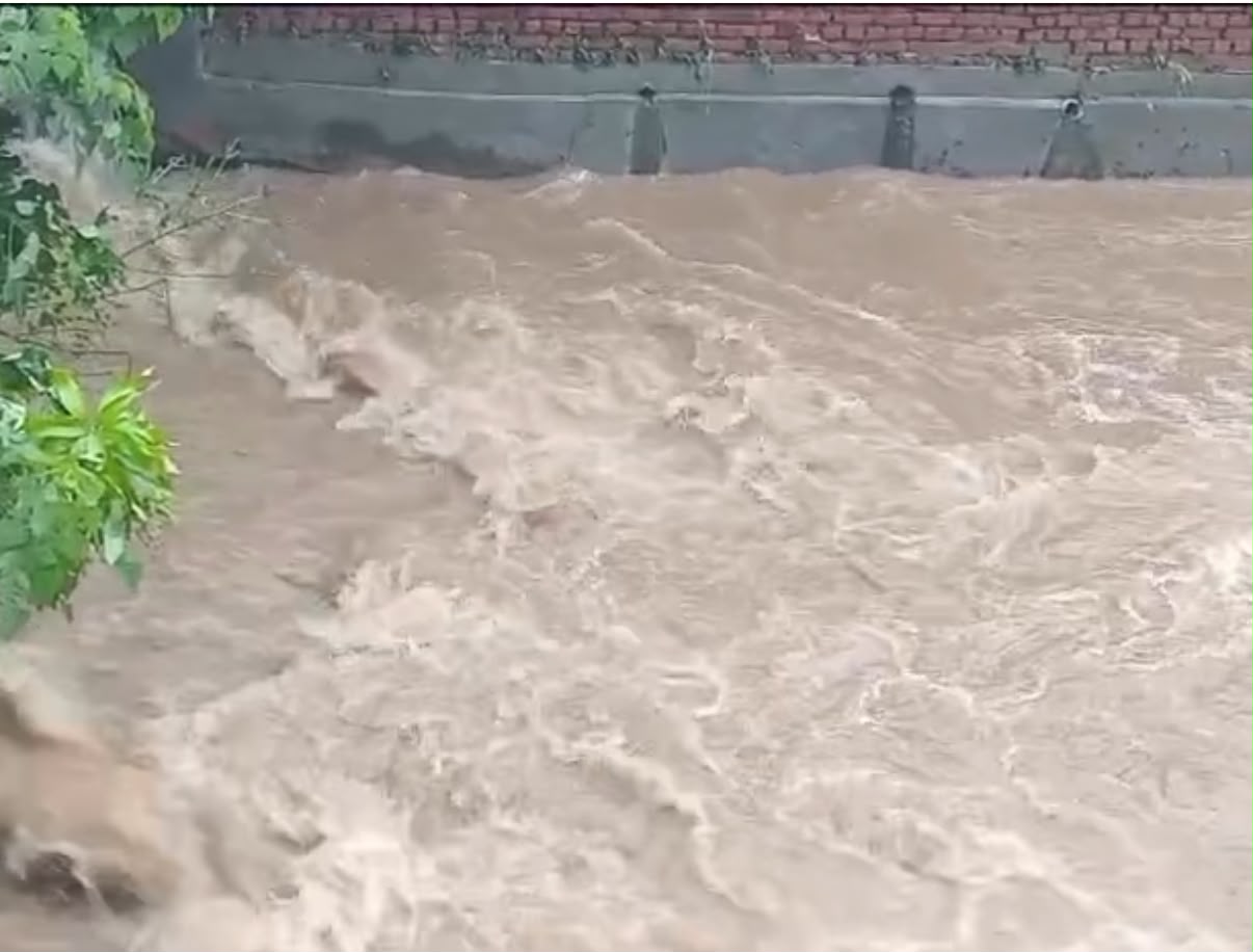 'Woman sweeps away in a flash flood  in Jammu,  husband narrowly escapes'