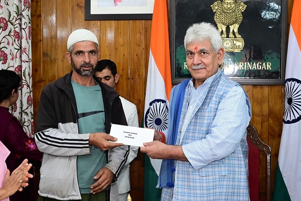 LG Manoj Sinha hands over total of 245 landless beneficiaries of PMAY-G