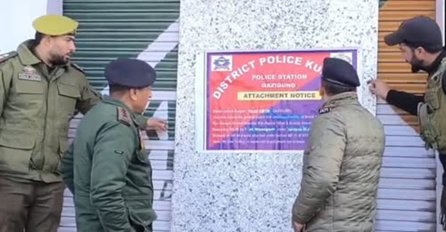 J&K Police attaches immovable properties worth approximately Rs 1.5 crore belonging to an alleged notorious drug peddler