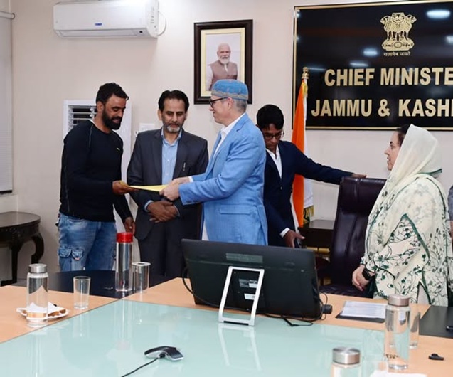 CM, Omar Abdullah hands over regularization orders to CPWs
