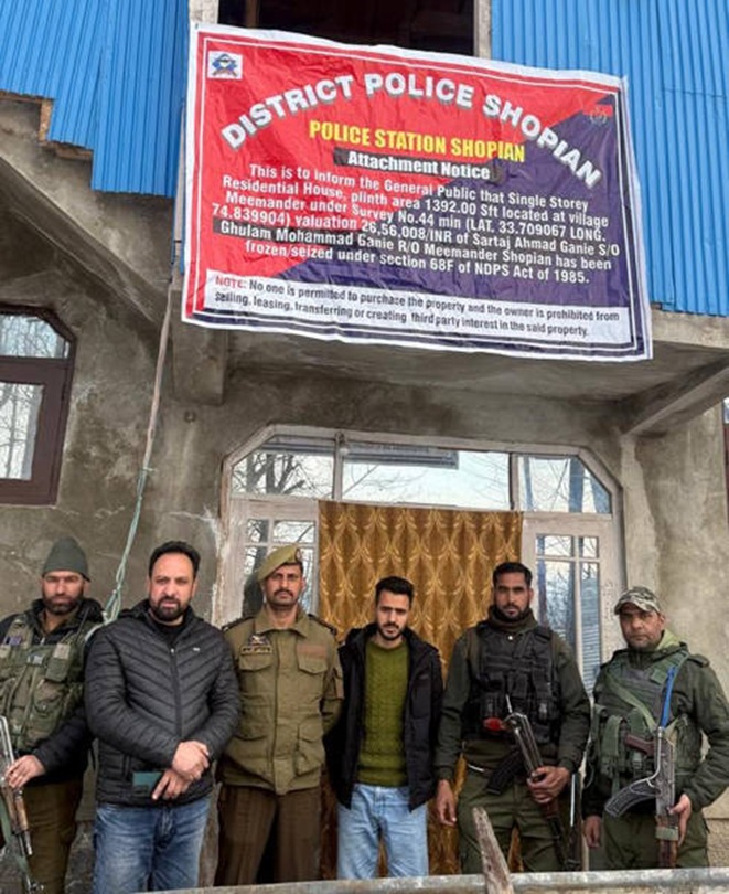 Police attach property of drug peddler in Shopian