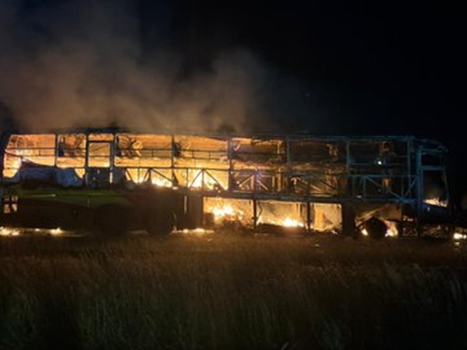 At least 25 people charred to death after a private travel bus caught fire