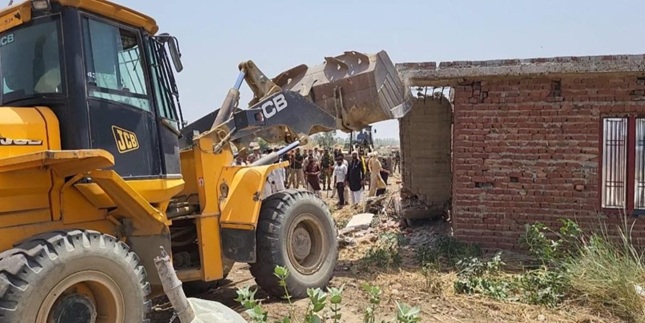 Nearly two dozen illegally built structures demolished in anti-encroachment drive in Kathua district 