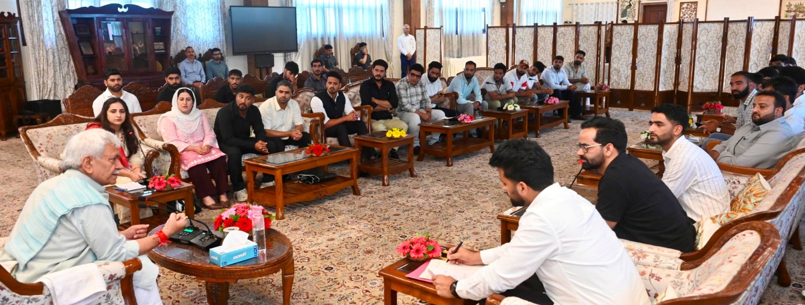 'Lieutenant Governor Manoj Sinha  interacts with volunteers of Save Youth Save Future Foundation'