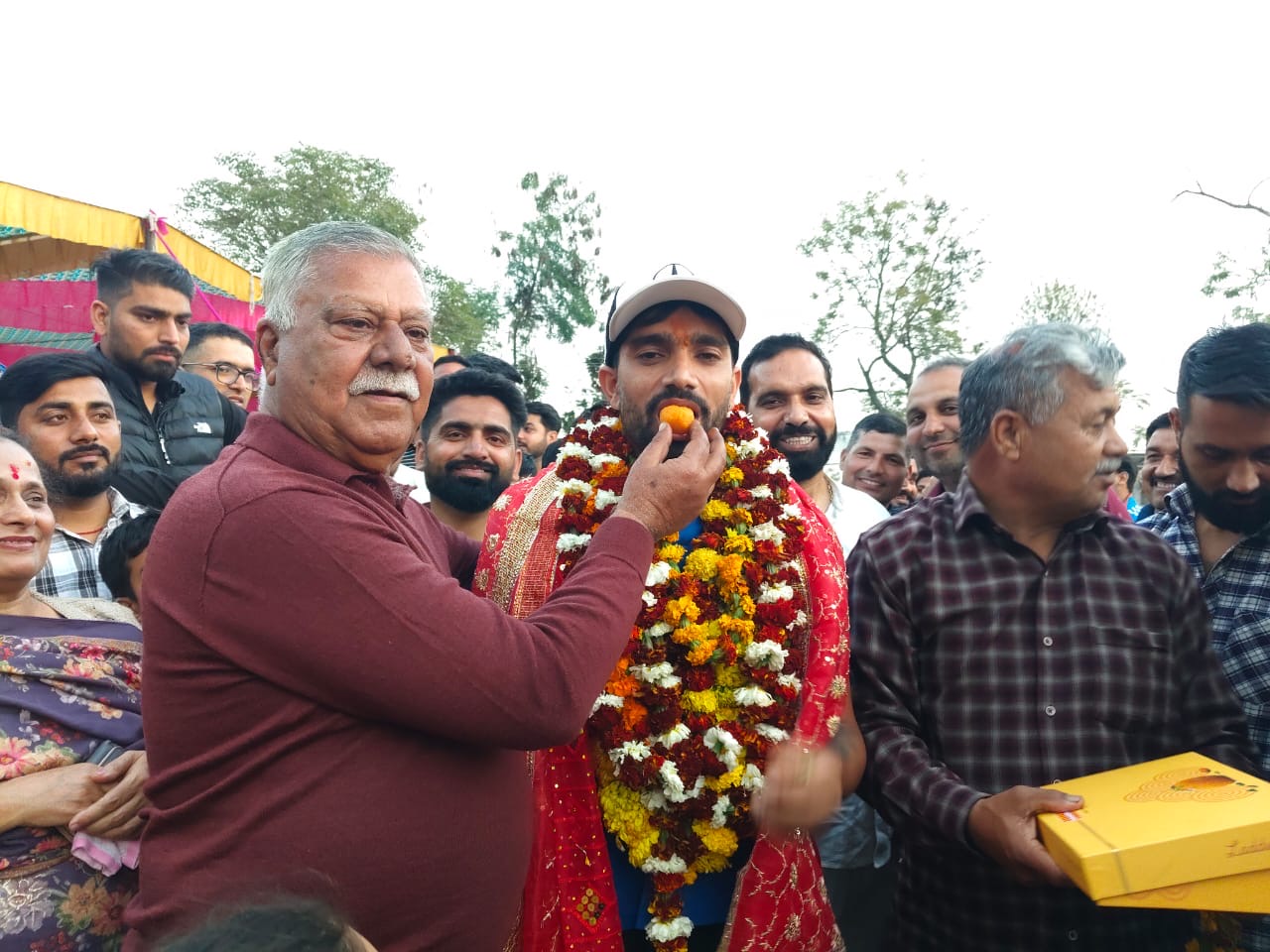 BJP leader Sukhnandan  Choudhary  felicitates J&K Cricketer Sahil Lotra for scoring Century in Ranji final 