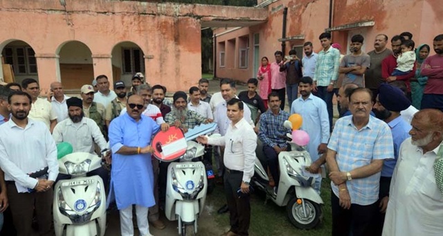 Dy CM distributes appointment letters, motorized tricycles among beneficiaries 