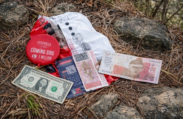 Two balloons with Pakistani Rs 5,000 currency note & US dollar attached recovered in Jammu