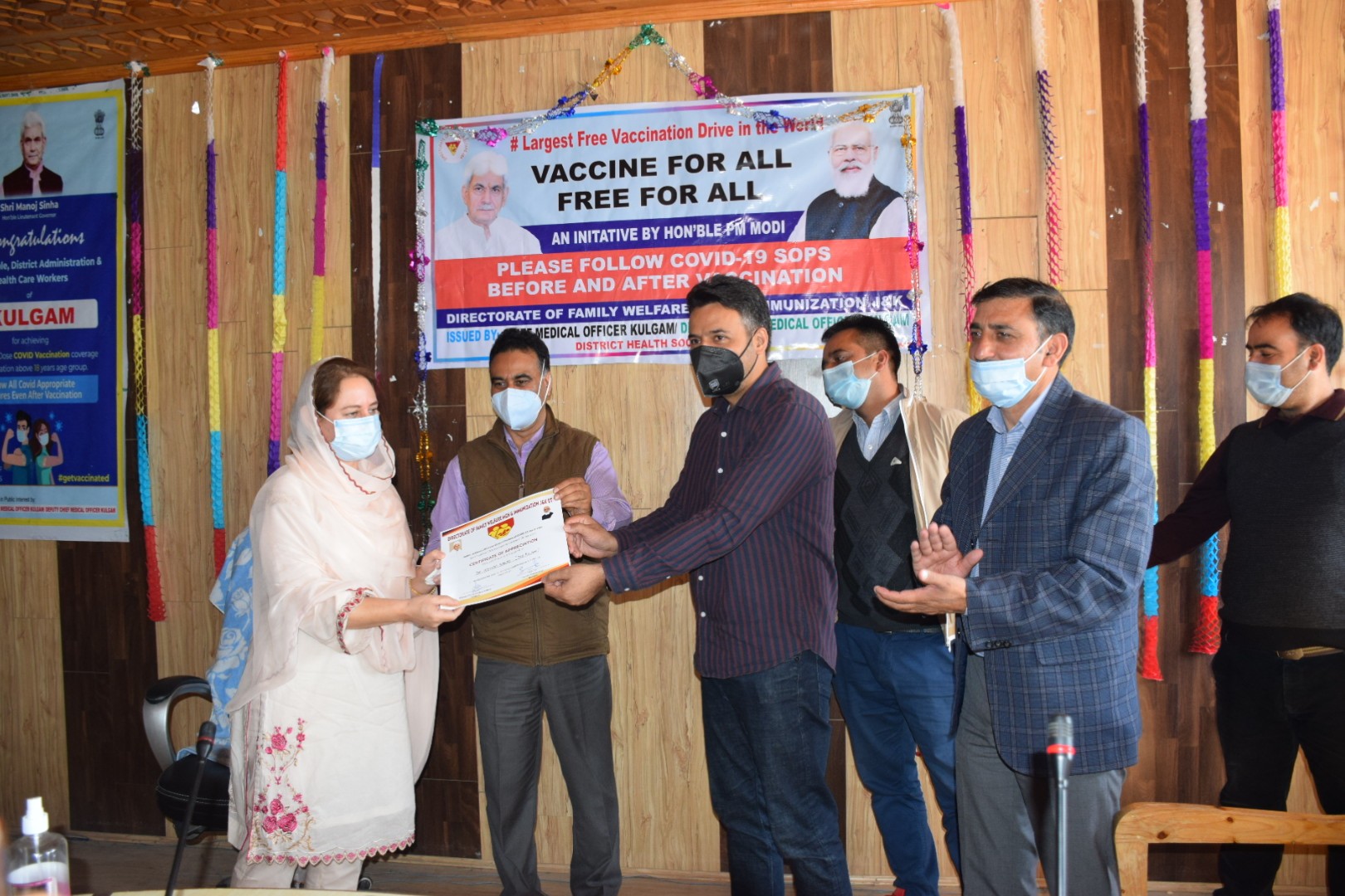 DC Kulgam felicitates health care workers for 100 percent vaccination